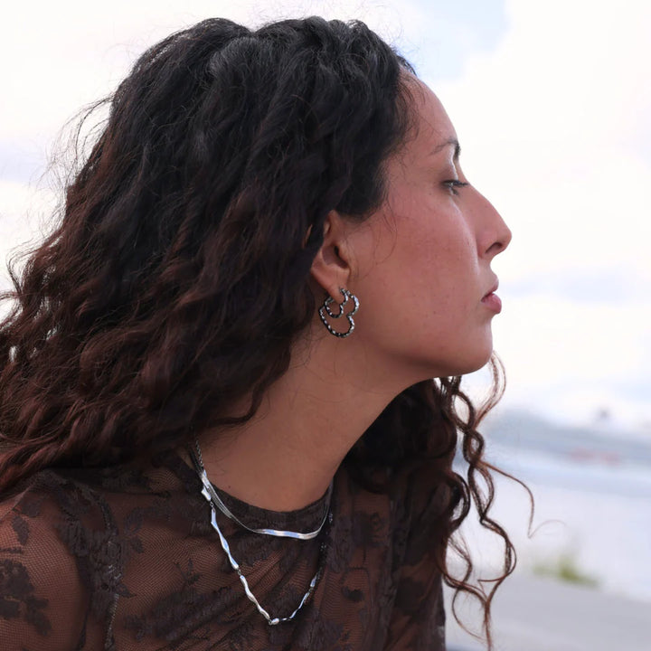 Sia øreringe sæt i stål