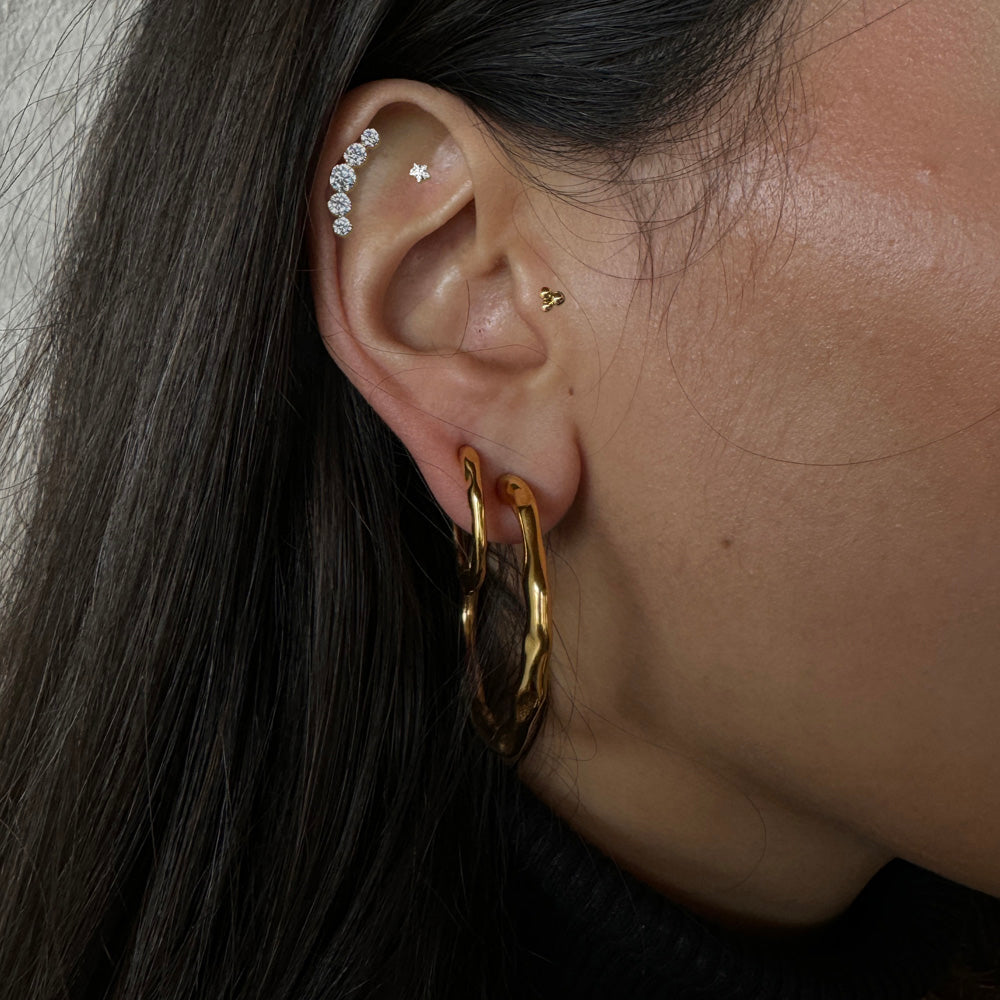 Line - Piercing gold-plated with zircons