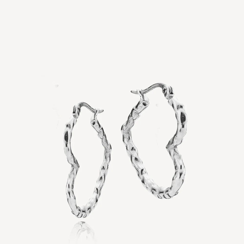 Sia øreringe sæt i stål